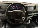 the interior of a car with a steering wheel, dashboard, and dash board