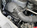 the engine of a car with its hood open and the hood up