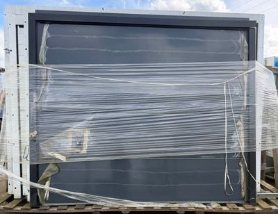 a lot of plastic wrapped up on the back of a truck