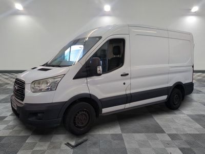 the white van is parked on a checkered floor in a room