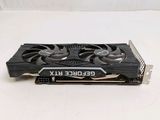 a close up of a video card on a white surface