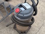 a vacuum that is sitting on the ground