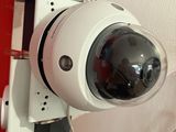 a security camera mounted on the side of a wall
