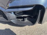 a close up of the front bumper of a car