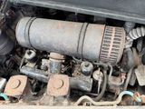 a close up view of an old engine in a car