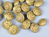 a pile of gold coins sitting on a white surface