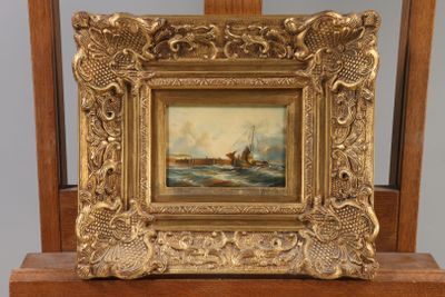 painting of a boat in a body of water on a wooden chair
