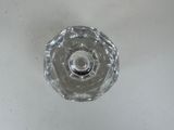 a clear glass vase on a white table