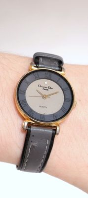a close up of a person ' s wrist with a watch on it