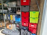 a garage with a lot of boxes and boxes on the shelves