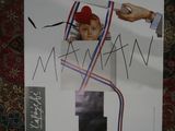 a poster with a picture of a man with a red hat on it