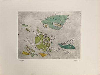 une image représentant un dessin d'un poisson et un poisson posé sur une table