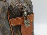 a close up of a louis vuitton toilet bag