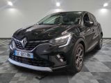 the front of a black renault c - cross parked on a checkered floor