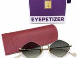 an image of a pair of sunglasses sitting on top of a red case