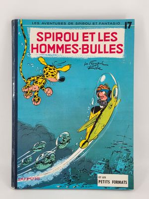 la couverture d'une bande dessinée sur laquelle figure un homme sur une planche de surf