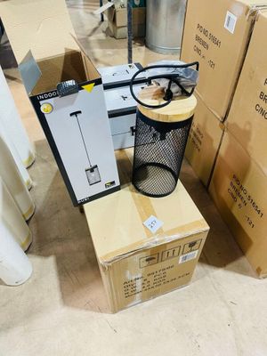 many boxes that are sitting on the floor next to each other