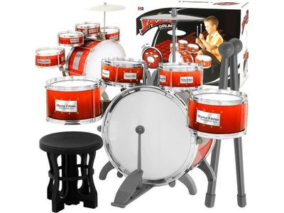 a drum set with stools and stools in front of it