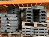a stack of pallets on a pallet rack in a warehouse