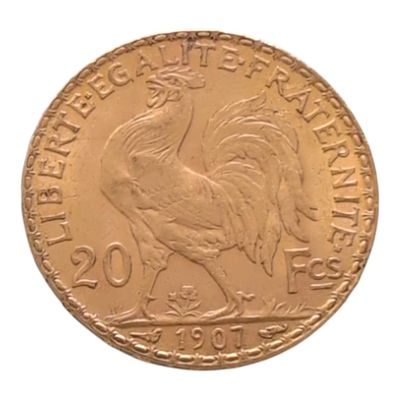 l'image d'une pièce d'or ornée d'un coq