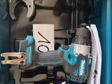 a blue box with tools in it and a hammer