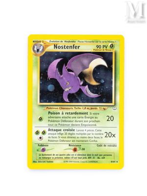 a close up of a pokemon card on a white surface