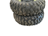 three tires stacked on top of each other on a white background