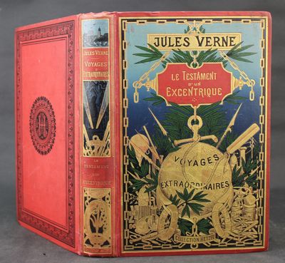 un livre rouge avec une couverture dorée