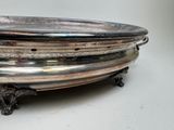 a silver plate that is sitting on a table