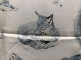 une photo d'un tissu sur lequel est représenté un renard