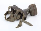 an old pair of binoculars on a white surface