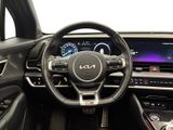the interior of a car with a steering wheel and a dash board