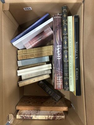 a box full of books sitting on a table