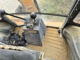 a view of the inside of a vehicle from the driver ' s seat