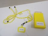 a yellow box with a lanyard attached to it