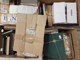a box full of books sitting on top of a floor