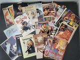 a lot of movie posters in a box on the table