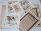 a lot of old postcards on top of a table