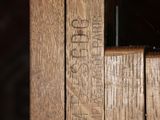 a close up of a wooden door with a window sill
