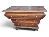 an old wooden chest of drawers on a white background