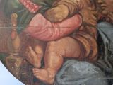 a painting of a man holding a baby in his lap