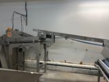 an image of a kitchen with a conveyor belt in it