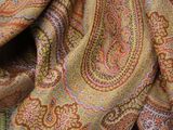 an image of a close up of a paisley pattern on a scarf