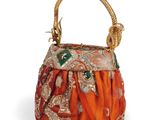 a close up of a purse on a white background