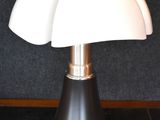 a lamp that is sitting on a black table