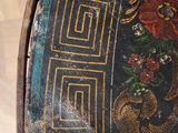 a close up of a piece of art on a table