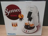 boxed box of a coffee machine with two cups of espresso