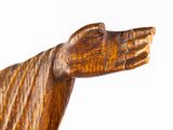 wooden statue of a person holding a hand with a white background