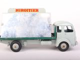 a toy truck with a mirror on the back of it