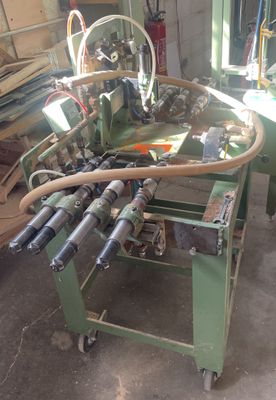 an image of a machine that is working on a piece of wood